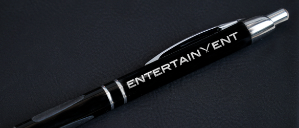 sleek black metal pen aon black background
