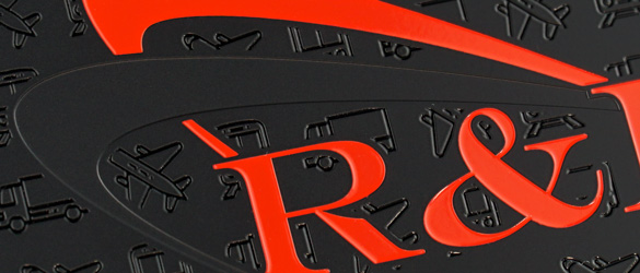 close up photo of screen printing on a black metal business card