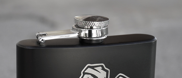 top of black metal flask