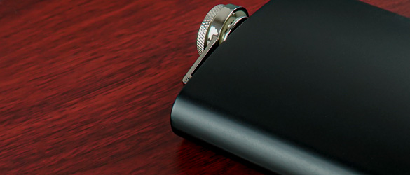 matte black flask on rosewood box