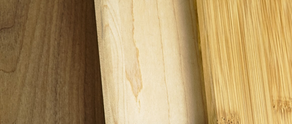 three different wood cutting board finishes