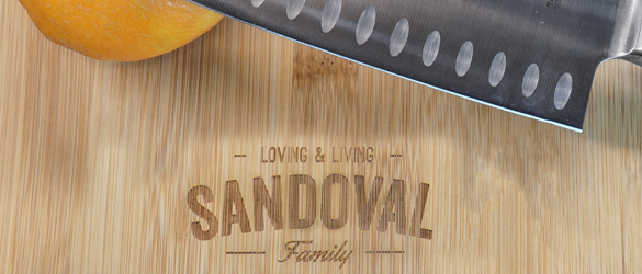 wood cutting  board in use with knife
