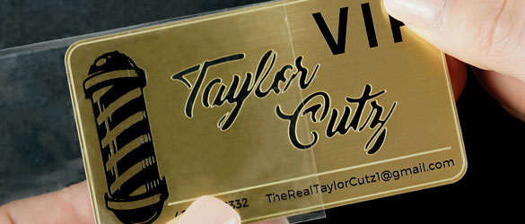 brass finish metal business card in clear plastic sleeve for protection