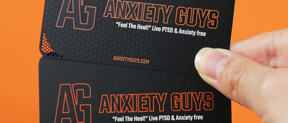 Paper Business Card compared to Metal Business Card in hand