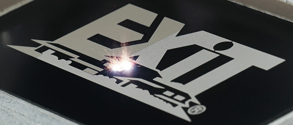 silver laser etching on black quick metal business card