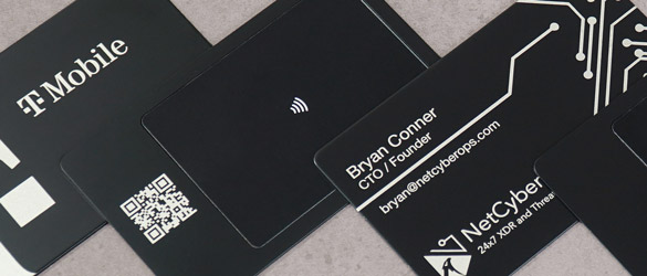 quick metal business cards chemically etched showing varying examples of cut out areas