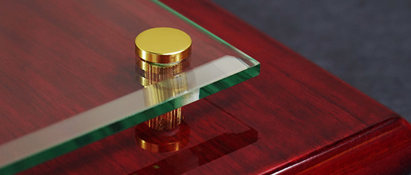 close up of rosewood plaque corner detail