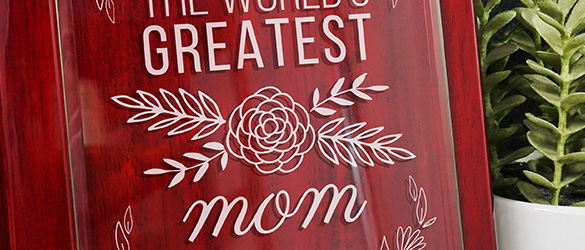 close up of laser etching on glass panel