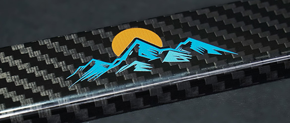 close up of printing on carbon fiber license plate frame