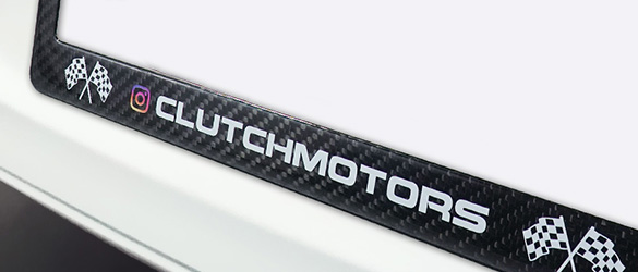 carbon fiber license plate frame on car