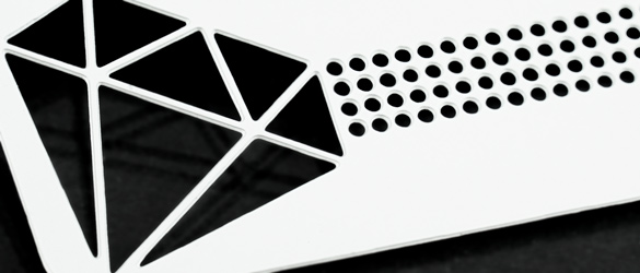 white metal business card chemically cut and etched