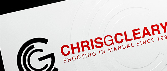 Red screen printing on a white metal business card