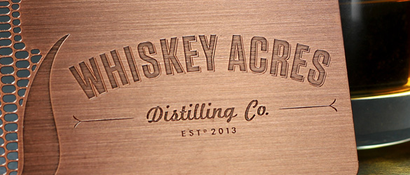 metal business card in copper finish showing unique brushed copper look